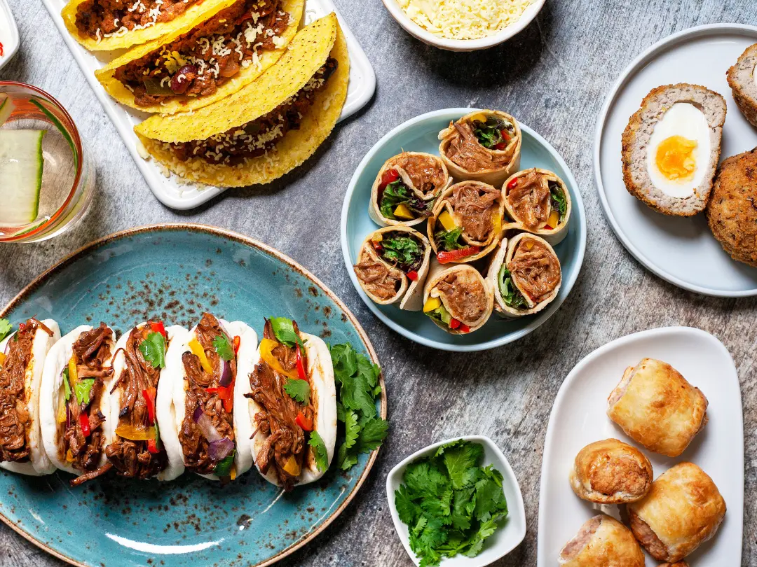 7 Summer Slow Cooker Recipes - pulled pork, beef brisket bao buns, moqueca, spanish chicken, chilli, hotdogs, ratatouille, salad