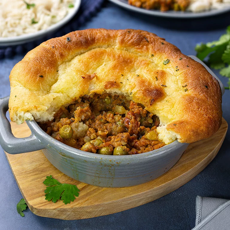Lamb keema pie with a golden naan bread crust made using Gordon Rhodes’ No Hurry Chicken Curry Gourmet Sauce Mix
